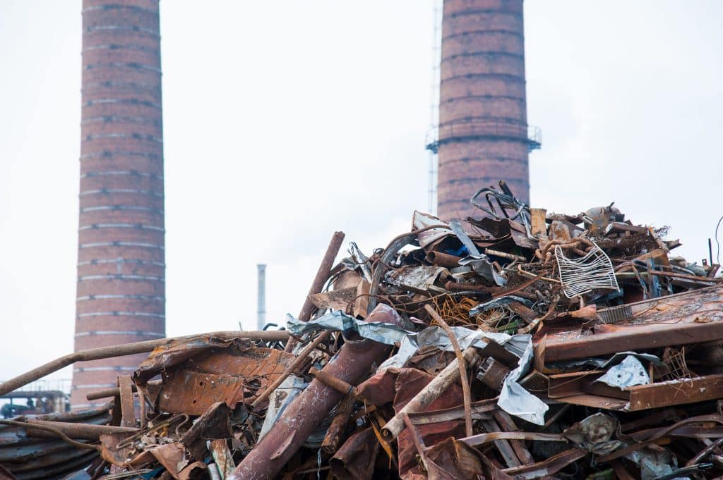Scrap Metal Recycling Plant And Crane-Loading Scrap In A Train
