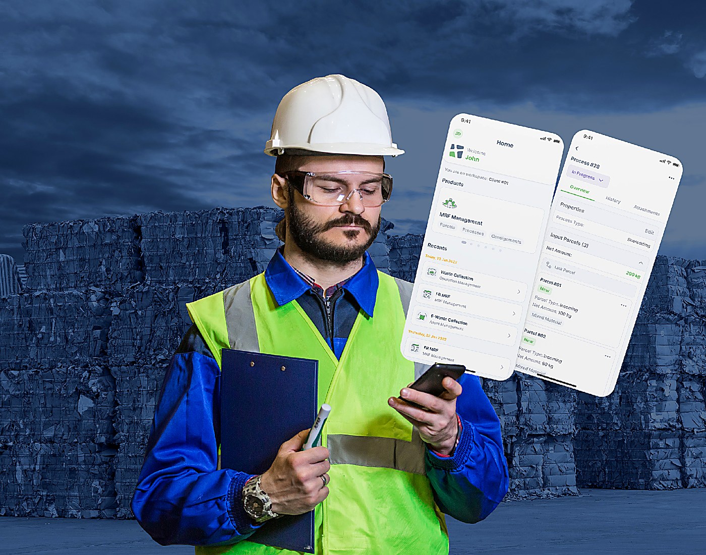 Facility worker in hard hat and safety glasses reviewing the Evreka MRF Management app on a phone, with baled paper in the background