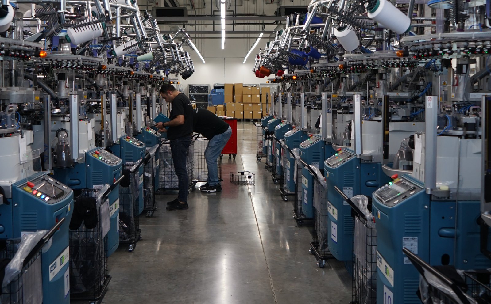 Knitting machines on a textile production line